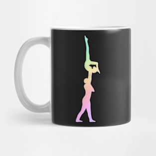 A mixed pair doing an arched handstand Mug